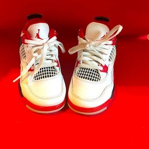 Air Jordan 4 “Fire Red” size 11c kids.